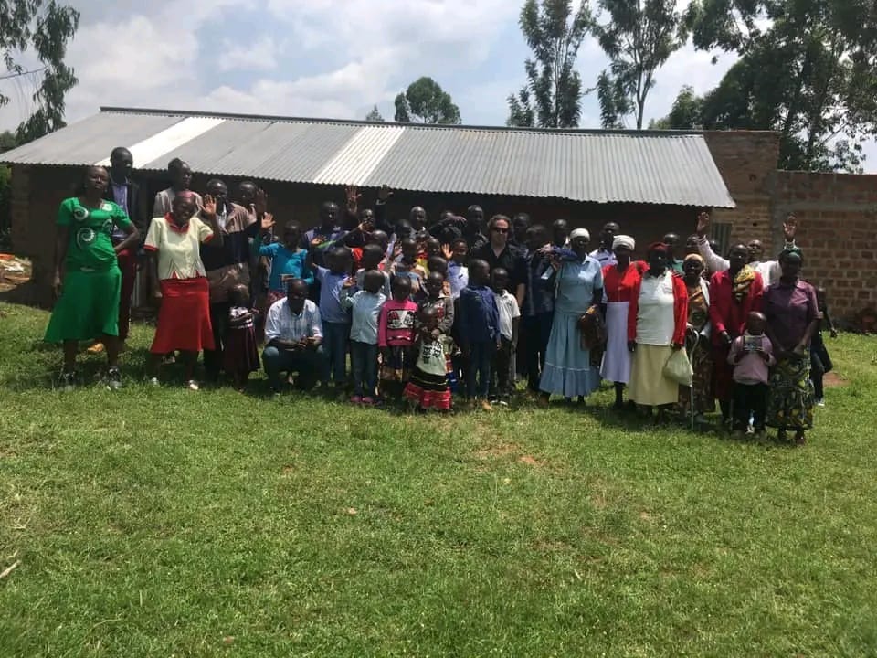 Members of the foundation standing on land to be purchased