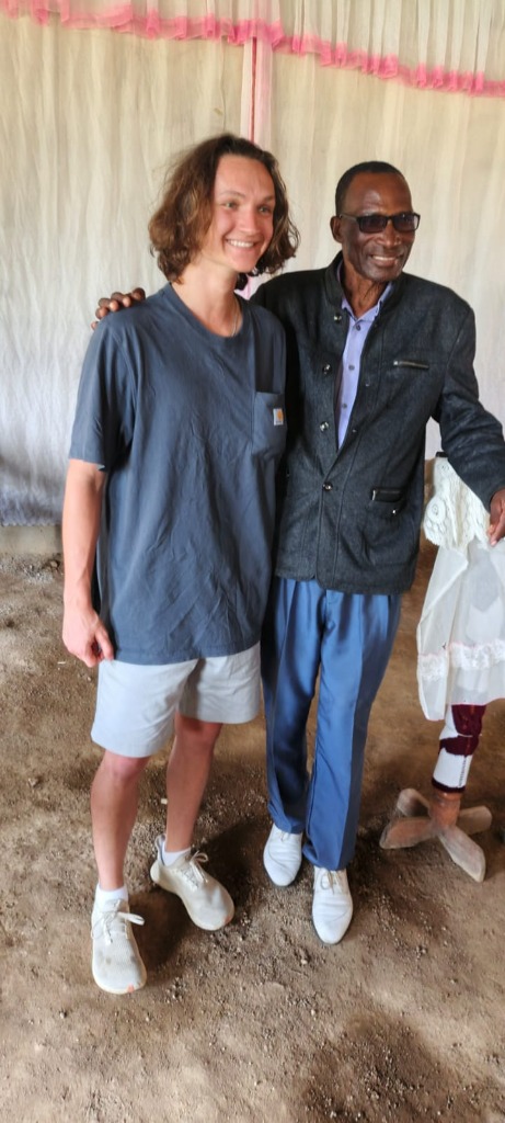 An international visitor with an elder of the foundation